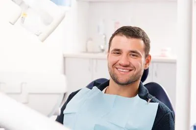 man smiling during his dental appointment at Southview Dental Care