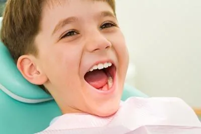 young boy laughing while visiting Southview Dental Care